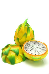 whole and two half of dragon fruit
