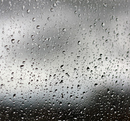 drops of rain on the window glass