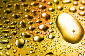Golden close-up water drops background