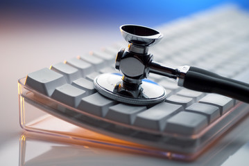 Stethoscope and keyboard