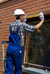 Man measures window