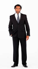 Serious businessman standing in front of camera