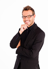 Happy businessman with glasses looking at the camera