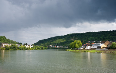 Fototapeta na wymiar View on river Moezel or Mosel after rainfall