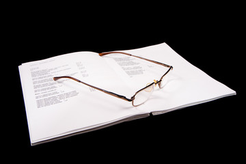 Glasses on a notebook