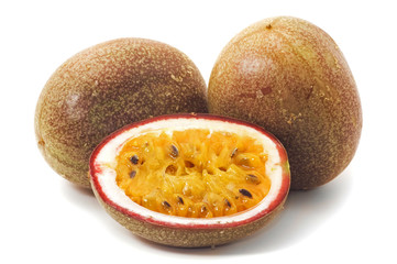 Passionfruits with pulp , isolated on white