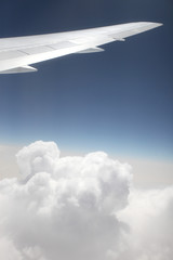 Fototapeta premium Flug in den Urlaub - Holiday flight