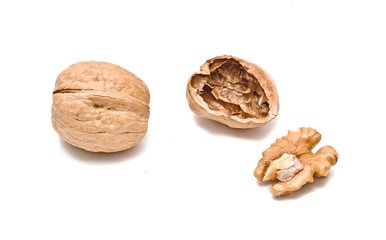 Cracked walnut isolated on white background