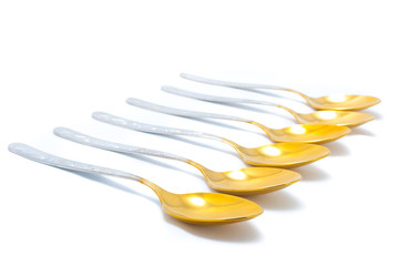 Six Spoons isolated on white