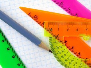 colorful rulers and pencil