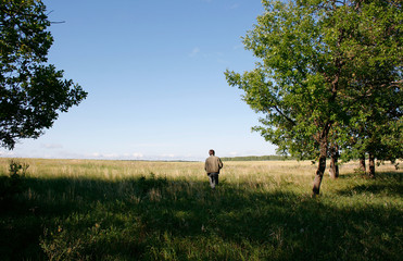man leaves in the field