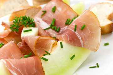 Prosciutto di Parma ham and three slice of melon