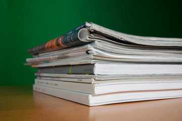 Stack of reading and research magazines