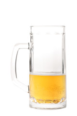 Half-drank beer mug isolated on white