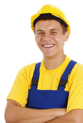 Happy young worker fold his arms and smile