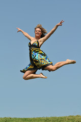 Woman jumping outdoors