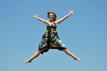 Woman jumping outdoors