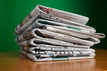 Stack of reading and research newspaper