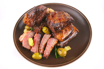 juice roast rib's close up  and olives