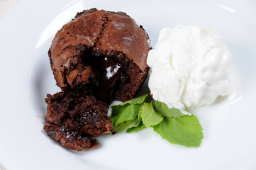 Cake and ice-cream on a white plate