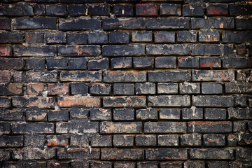 old black brick wall