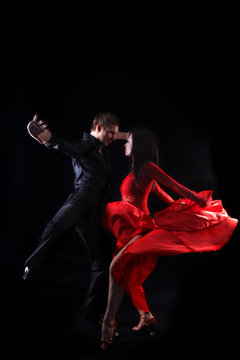 dancers against black background © konstantant