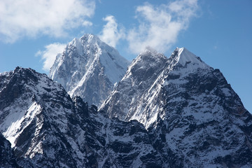 Impregnable rock summits covered with snow and ice, Himalaya, Nepal