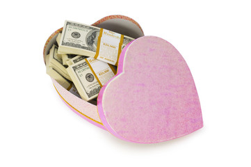 Heart shaped gift box and dollars inside
