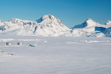 Inuit village and mountains, Greenland © Anouk Stricher