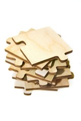 Wooden puzzle on a pile