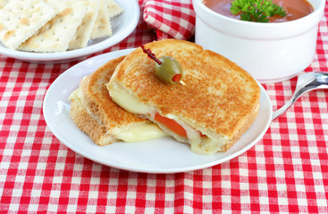 Grilled Cheese and Tomato Sandwich with a side of Tomato Soup.