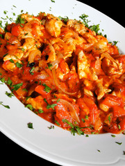 Chiken meat with vegetables and seasoning