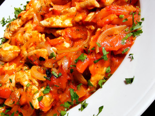 Chiken meat with vegetables and seasoning