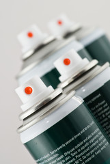 Aluminum spray cans with nozzles
