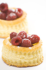 raspberry pastry cream and decorated with lemon parsley