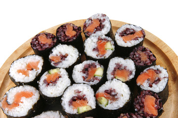 sushi on wooden plate