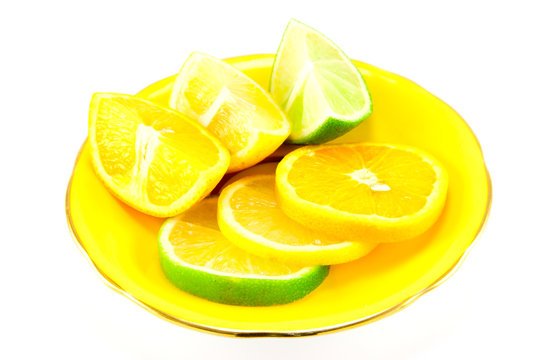 Citrus Fruit on a Yellow Plate