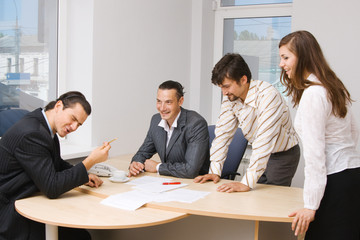 Office workers having a discussion