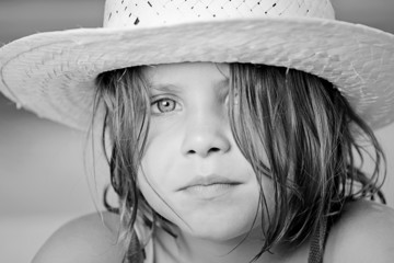Black and White Shot of a Pretty Child in Summer Hat