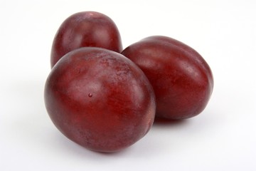 Plumbs on white background