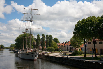 sailboat at city center in the river