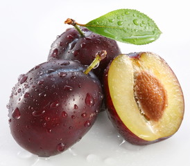 Plums on a white background