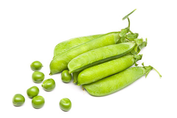 Pods of fresh green peas on a white background