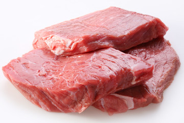 Raw meat on a white background