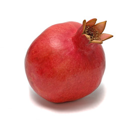 Ripe pomegranate  isolated on white background