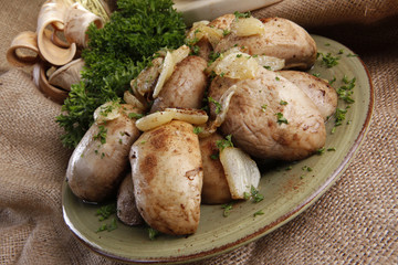 Stuffed giant sautee mushrooms in garlic and olive oil dressing