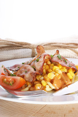 Pasta with bacon and sweet corn tomato sauce