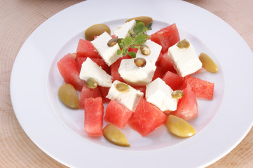 Melon and feta salad on a plate