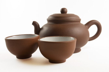 Brown chinese tea set with small tea cups