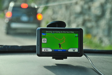 GPS unit on windshield with another car